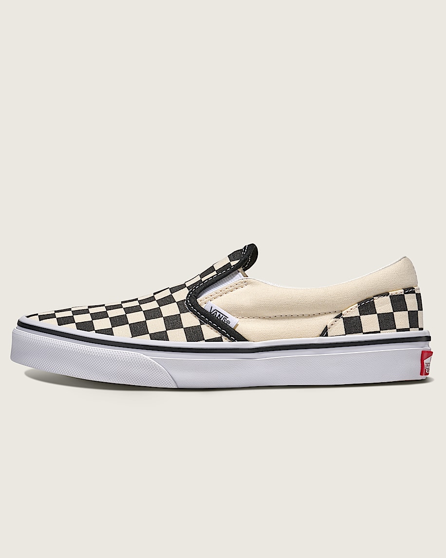klassiska slip-on-skor för stora barn i schackrutigt utförande