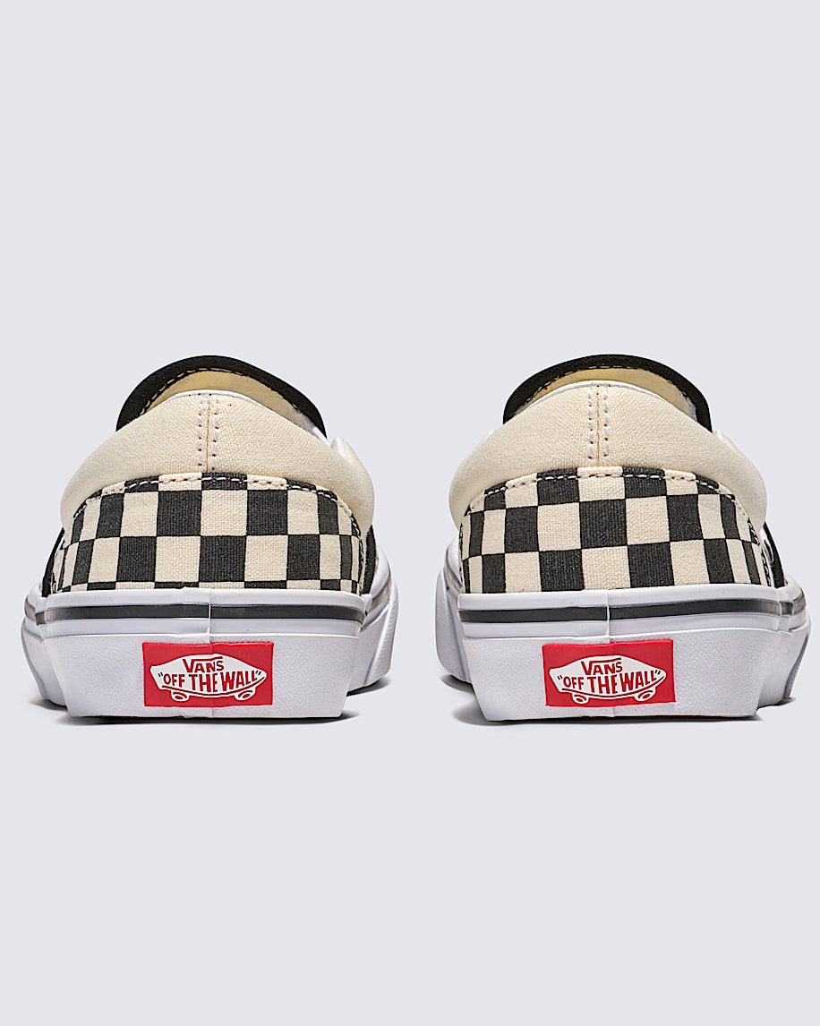 klassiska slip-on-skor för stora barn i schackrutigt utförande